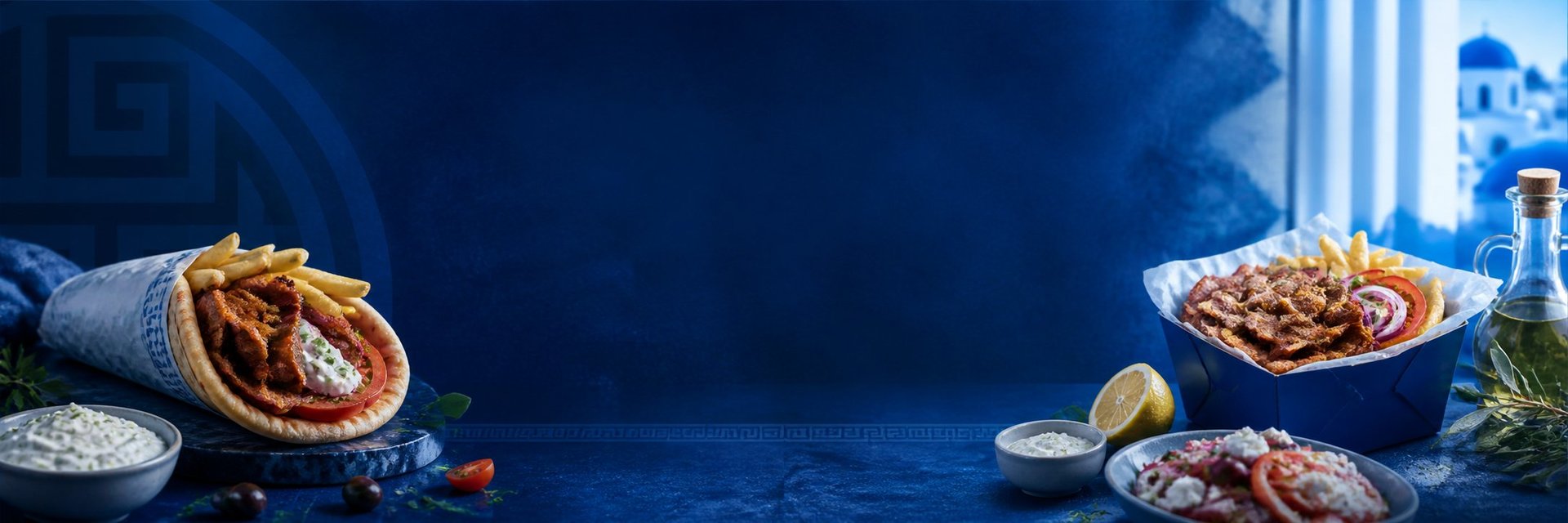 Grapefruit halves and bowls of food arranged on blue surface with blurred background